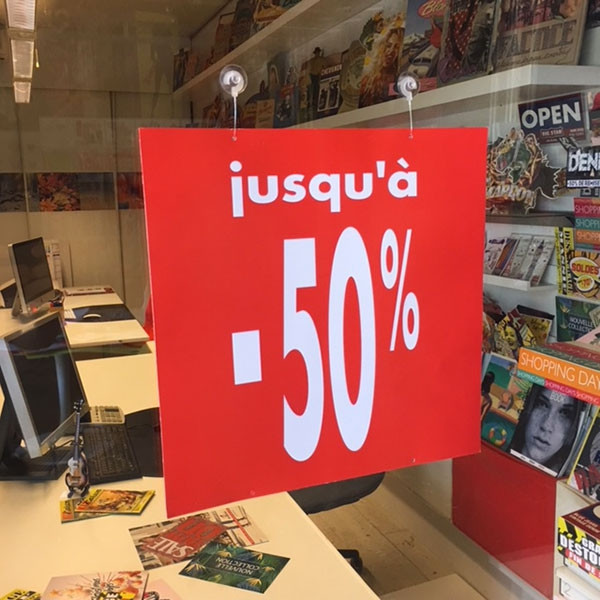 Carton "jusqu'à -50 %" L34 H34 cm et 2 ventouses recto verso identiques