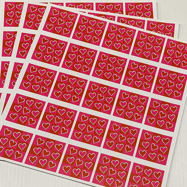 10  planches de stickers  "coeurs roses"